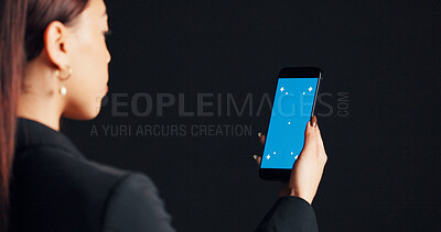 Buy stock photo Smartphone, green screen and hand of woman in studio with networking, communication or social media. Phone, space and female person with technology for contact with email online by black background.
