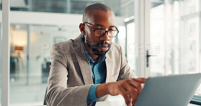 Buy stock photo Office, reading and businessman with laptop, serious and financial analysis on web, online and point. Investment banker, black person and planning for pitch with tech, review and checking market