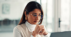Woman, writer and stress with computer at startup, review ot glasses for project management at office. Person, media consultant and proposal on pc, insight or confused with article at creative agency