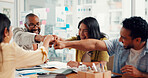 Team, fist bump and celebration with success at digital agency, motivation and goals at office meeting. Business people, smile and excited with charts, web traffic or statistics at startup company