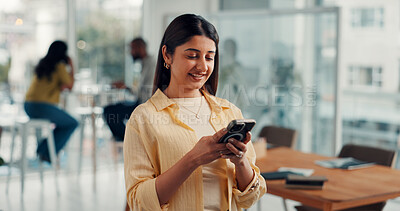 Buy stock photo Phone, happy and businesswoman in office with networking, communication or social media on mobile app. Smile, technology and female person with cellphone for texting, chatting or contact in workplace