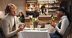 Phone, bored and couple on date in restaurant together for networking, social media or texting. Cellphone, argument and interracial man with woman on technology for chatting on mobile app at dinner.