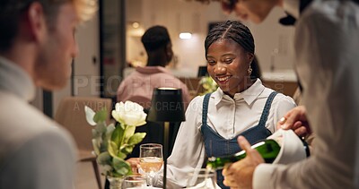 Buy stock photo Couple, dating and smile in restaurant with wine for service, romance or anniversary celebration. Hospitality, conversation and waiter with man, happy woman and dinner with alcohol and bonding
