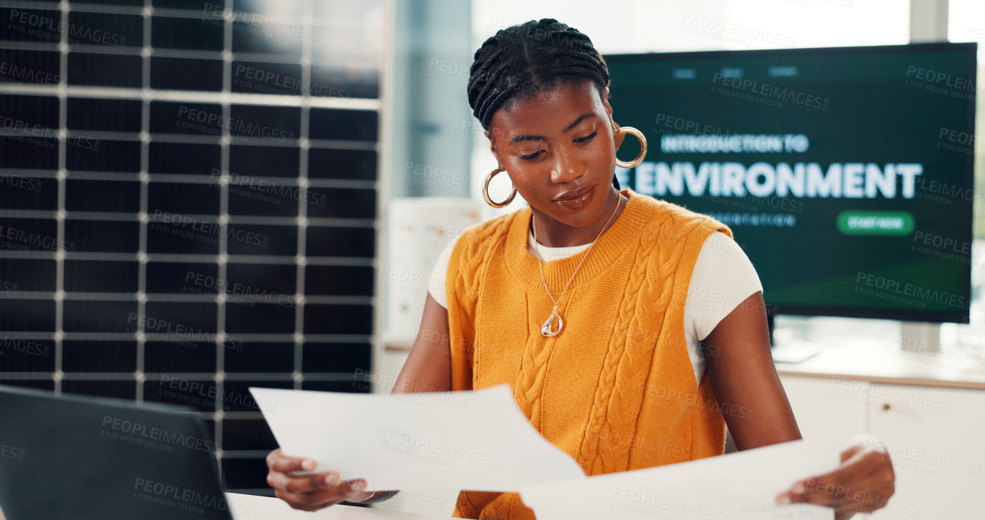 Buy stock photo African woman, reading and document in office for results, energy saving stats and sustainable. Person, laptop and paperwork with photovoltaic grid revenue, company performance and solar panel sales