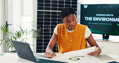 Buy stock photo Black woman, paperwork and typing on tablet in office for research, energy saving stats and results. Person, tech and document for photovoltaic grid revenue, company performance and solar panel sales