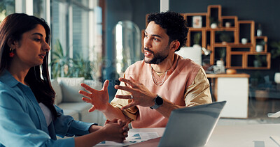 Buy stock photo Talking, man and woman with laptop, office and planning for design project, discussion and paperwork. Graphic designer, brainstorming and colleagues with tech for brand identity, graphs and documents