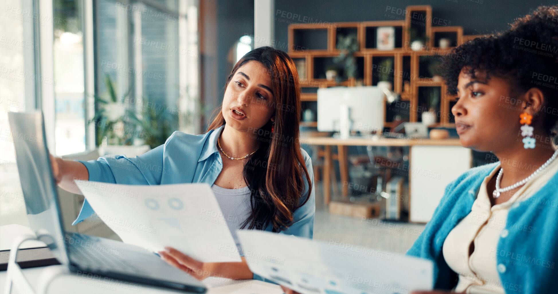 Buy stock photo Media agency, laptop and women with documents, talking and stats for sales increase. People, magazine editor and journalists in meeting, online engagement or pc with charts for profit growth or email