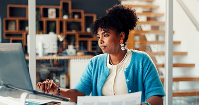 Buy stock photo African woman, laptop and document at house for research, finance report and data analysis. Female person, remote work and typing on pc with financial paperwork, revenue graphs and audit information