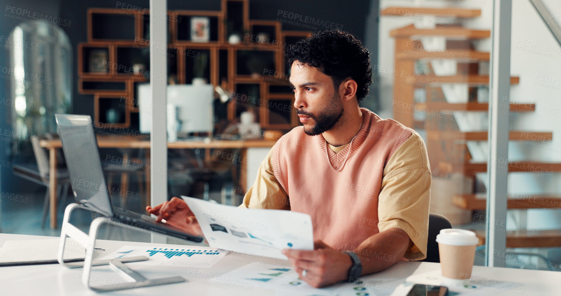 Buy stock photo Laptop, business man and paperwork in office for campaign oversight, KPI data or market trends. Marketing manager, tech or SEO graphs to track user behavior, project management or competitor analysis