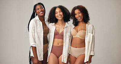 Buy stock photo Portrait, underwear and women in studio for body positivity, wellness and funny with natural beauty. Diversity, lingerie and friends with confidence, inclusion and laugh on gray background space