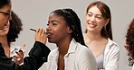 Backstage, getting ready and makeup with women in studio for fashion showcase preparation. Behind the scenes, beauty or cosmetics with cosmetologist and talent on white background for styling