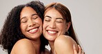 Portrait, smile and women in studio, dermatology and wellness on gray background. Cosmetics, skincare and happy people with healthy skin, texture and aesthetic with makeup, grooming and beauty