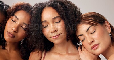 Buy stock photo Aesthetic, diversity and eyes closed with women in studio for skincare, inclusion and self care. Dermatology, beauty and solidarity with people on white background for salon, support and glow