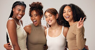 Buy stock photo Hug, fashion and portrait of women in studio with bonding, happiness or trendy outfit together. Female empowerment, peace sign and girl friends with casual style for confidence by white background.