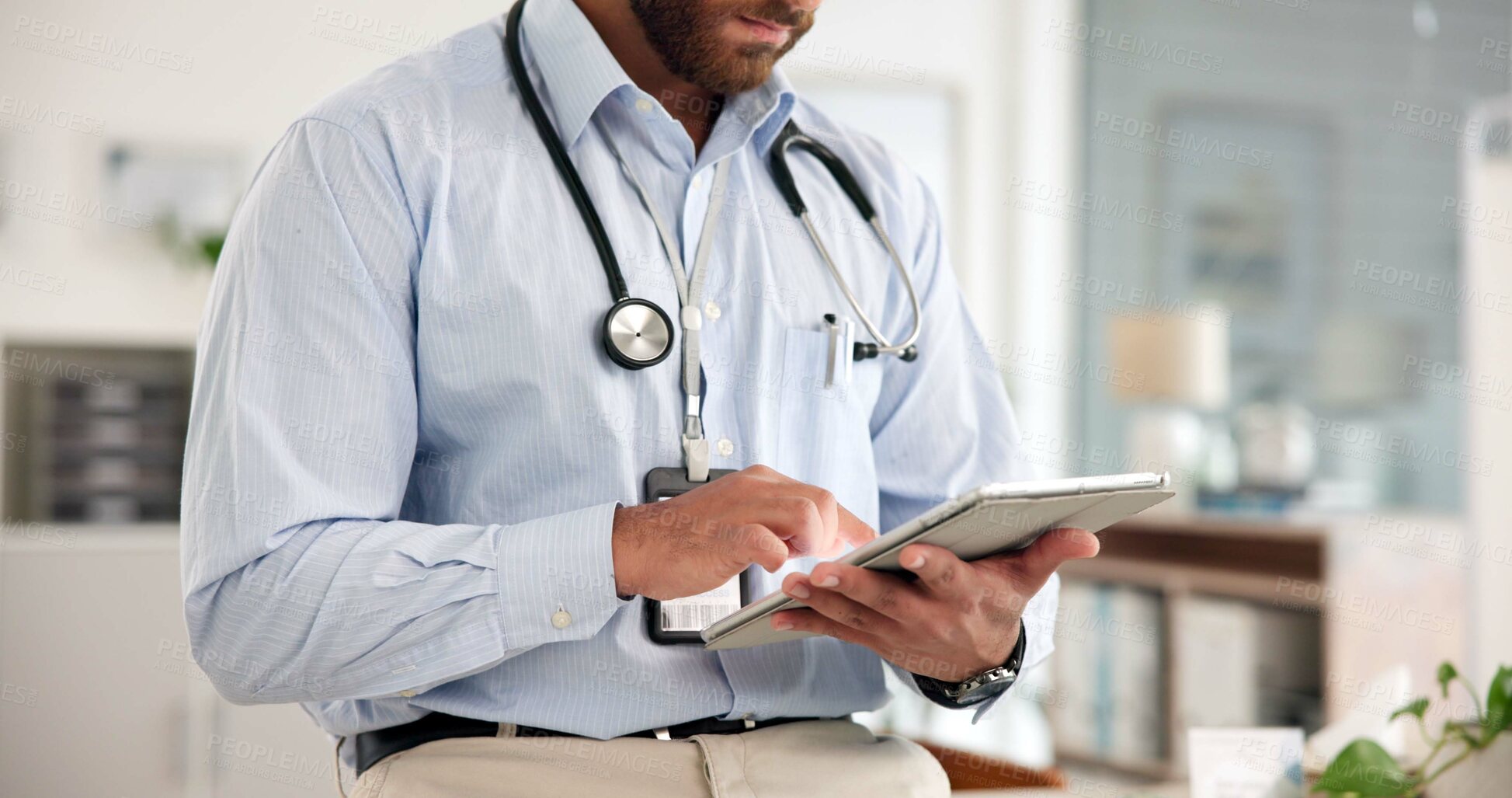 Buy stock photo Hands, healthcare and tablet with doctor in hospital for planning, research or review of records. App, medical and telehealth with man in office of clinic for diagnosis results, feedback or report