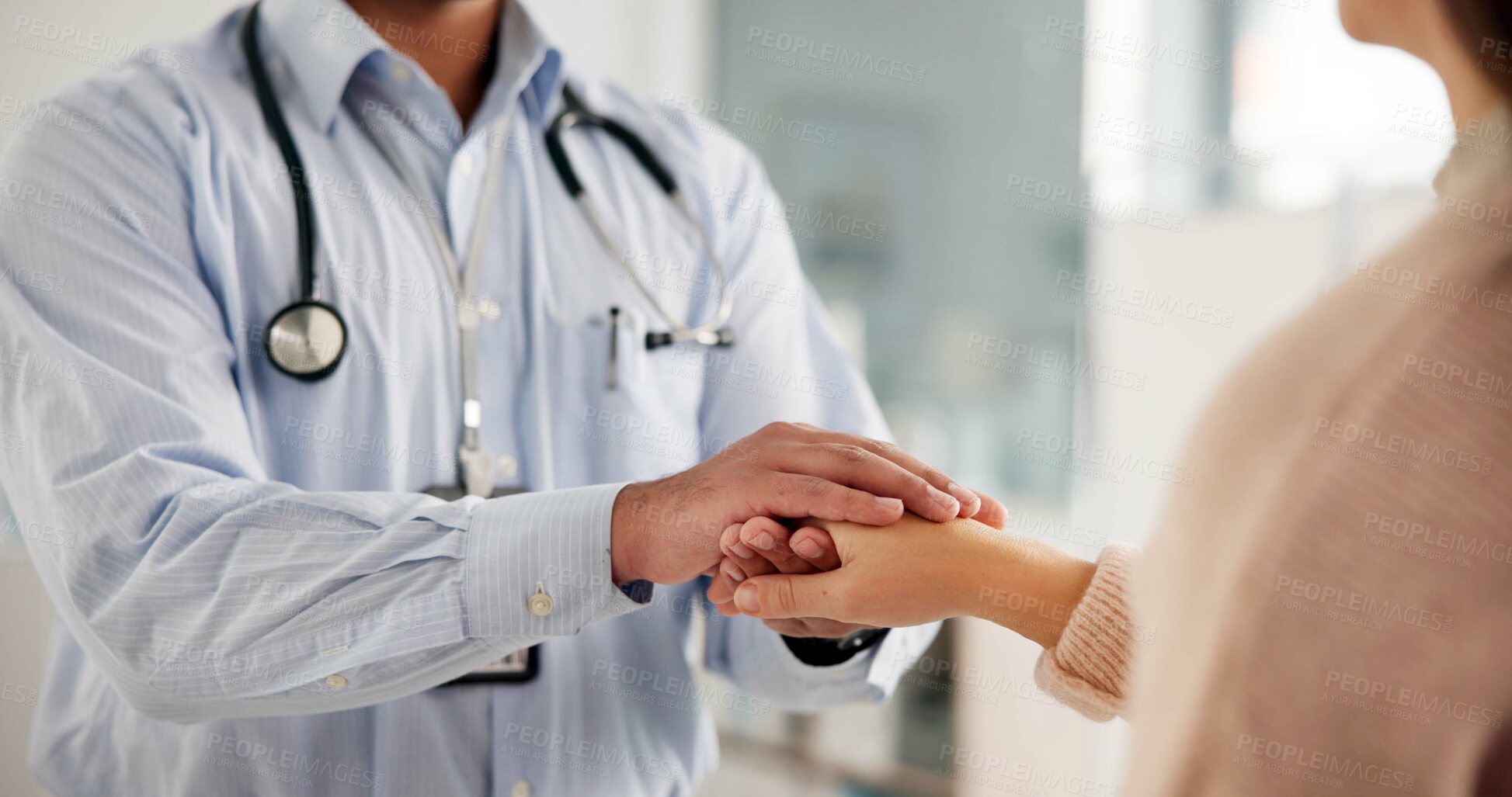 Buy stock photo Advice, doctor and patient holding hands in office for care, kindness and help in clinic. Support, comfort and medical advisor with person for empathy, counseling or hospital healthcare consultation