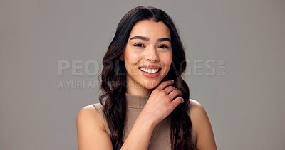 Buy stock photo Beauty, happy and portrait of woman in studio for cosmetics, wellness and skincare. Dermatology, mockup space and face of person with smile for natural texture, glow and shine on gray background