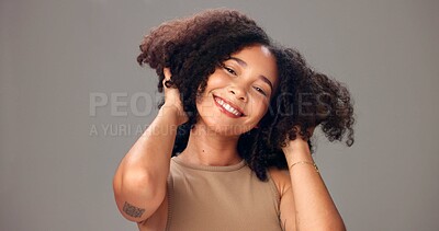 Buy stock photo Haircare, portrait and woman in studio, growth or maintenance of texture, shine and white background. Happy, African person and confident for healthy hair, mockup space and self care for hairstyle