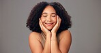 Beauty, woman and happy with skincare in studio for healthy skin, natural glow and hydration. Mockup space, girl and smile on gray background for collagen treatment results, haircare and dermatology