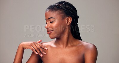 Buy stock photo Skincare, glow and woman in studio, beauty or smooth skin with cosmetics, health and gray background. Happy, black person and self care with dermatology for hydration, wellness and smile for shine