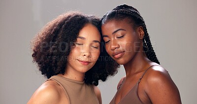 Buy stock photo Skincare, eyes closed and women in studio, beauty or dermatology on gray background. People, cosmetics or support with confidence, grooming or shine with glow, aesthetic or wellness with healthy skin