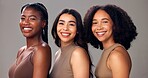 Happy women, portrait or natural beauty with diversity, skin tone or cosmetics on studio background. Female people, interracial or multiracial with smile for skincare, health or wellness in salon