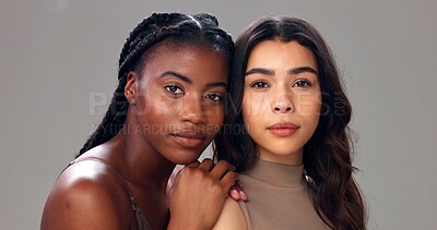 Buy stock photo Portrait, skincare and women in studio, shine and aesthetic with glow on gray background. Dermatology, cosmetics or people with treatment, healthy skin and grooming with support, wellness and pride