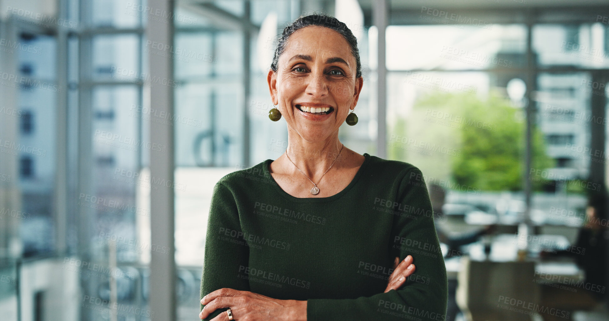 Buy stock photo Portrait, financial advisor or mature woman with arms crossed in business office, pride or about us.Investment management, professional or consultant with smile, career development or confidence
