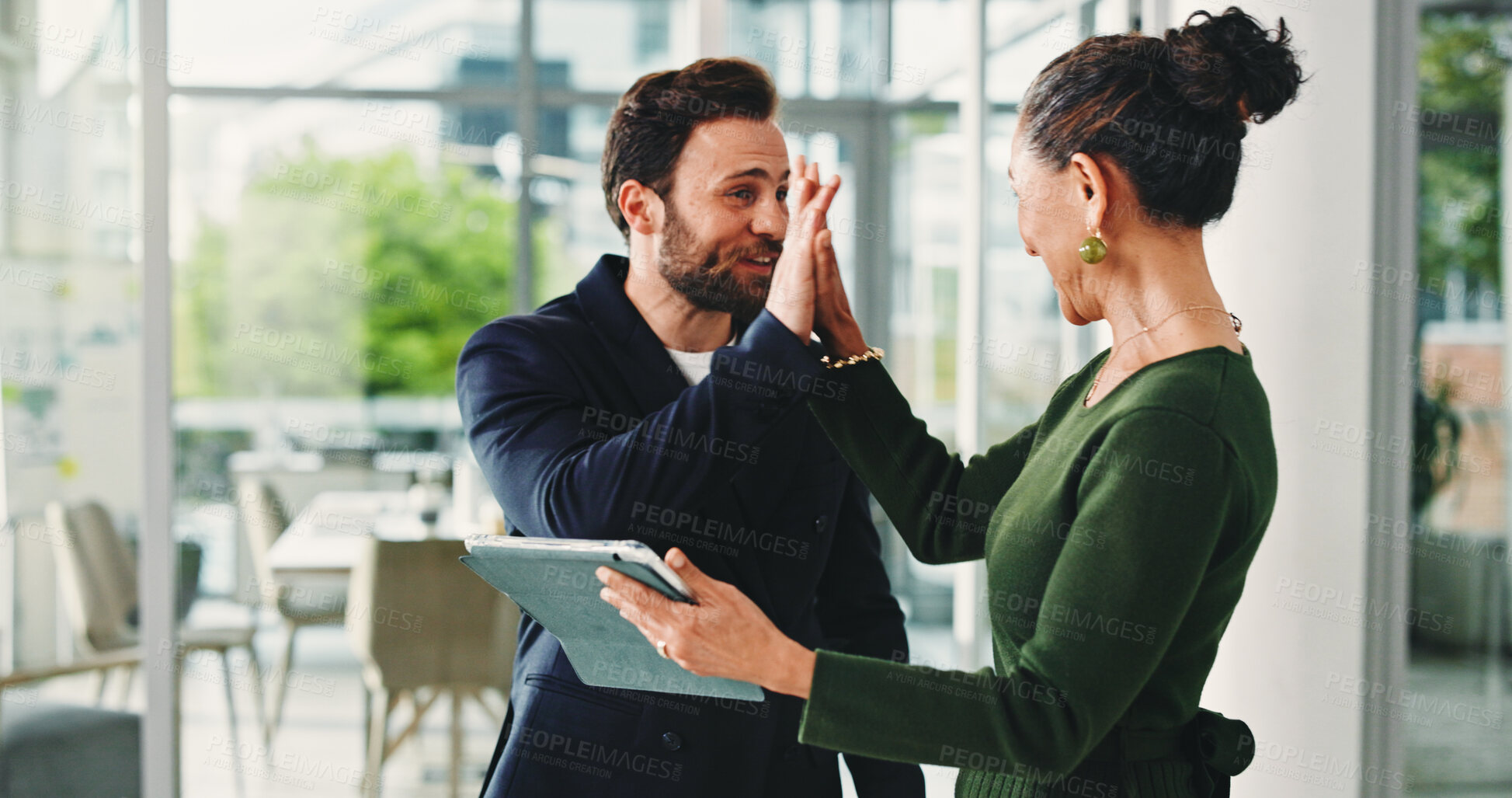 Buy stock photo Businessman, high five and celebration with woman, tablet or achievement with financial job at office. People, broker and motivation with team goal, profit or results for revenue at investment agency