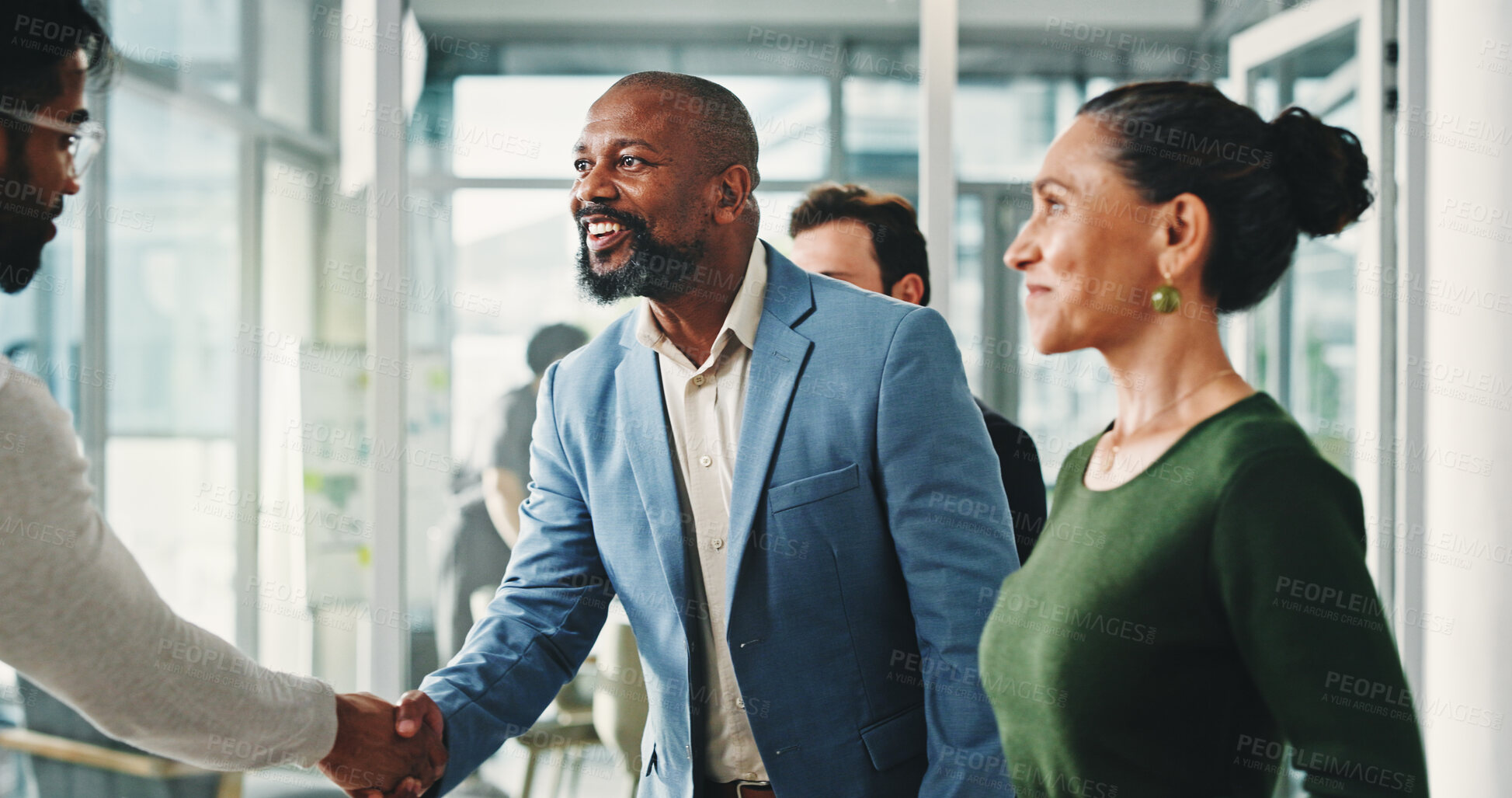 Buy stock photo Businessman, handshake and happy with team, success and congratulations with promotion at office. People, excited and shaking hands with goals, profit and thanks with praise at investment agency