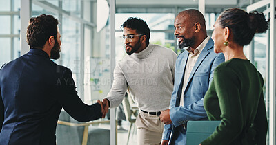 Buy stock photo Businessman, shaking hands and success with team, happy and congratulations with promotion at office. People, excited and handshake with goals, profit and thanks with achievement at investment agency