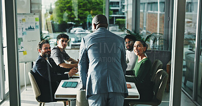 Buy stock photo Man, presentation and group at office meeting, discussion and review with attention at finance company. Person, speaker and back with team, feedback and planning for strategy at investment agency