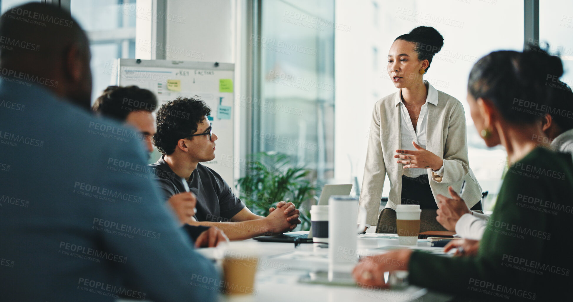 Buy stock photo Woman, presentation and group at office meeting, talk and review with documents at finance company. Person, speaker and paperwork with team, feedback and planning for strategy at investment agency