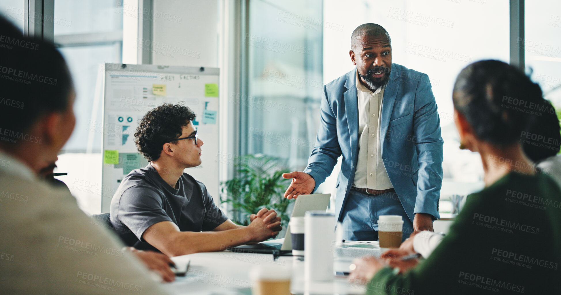 Buy stock photo Businessman, presentation or meeting with team, whiteboard or planning for project in office. Man, employee or coach with group for brainstorming, staff training or business workshop in workplace