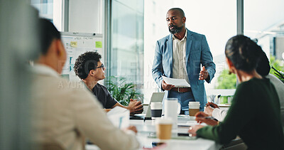 Buy stock photo Man, presentation and group at office meeting, talk and review with documents at finance company. Person, speaker and paperwork with team, feedback and planning for strategy at investment agency