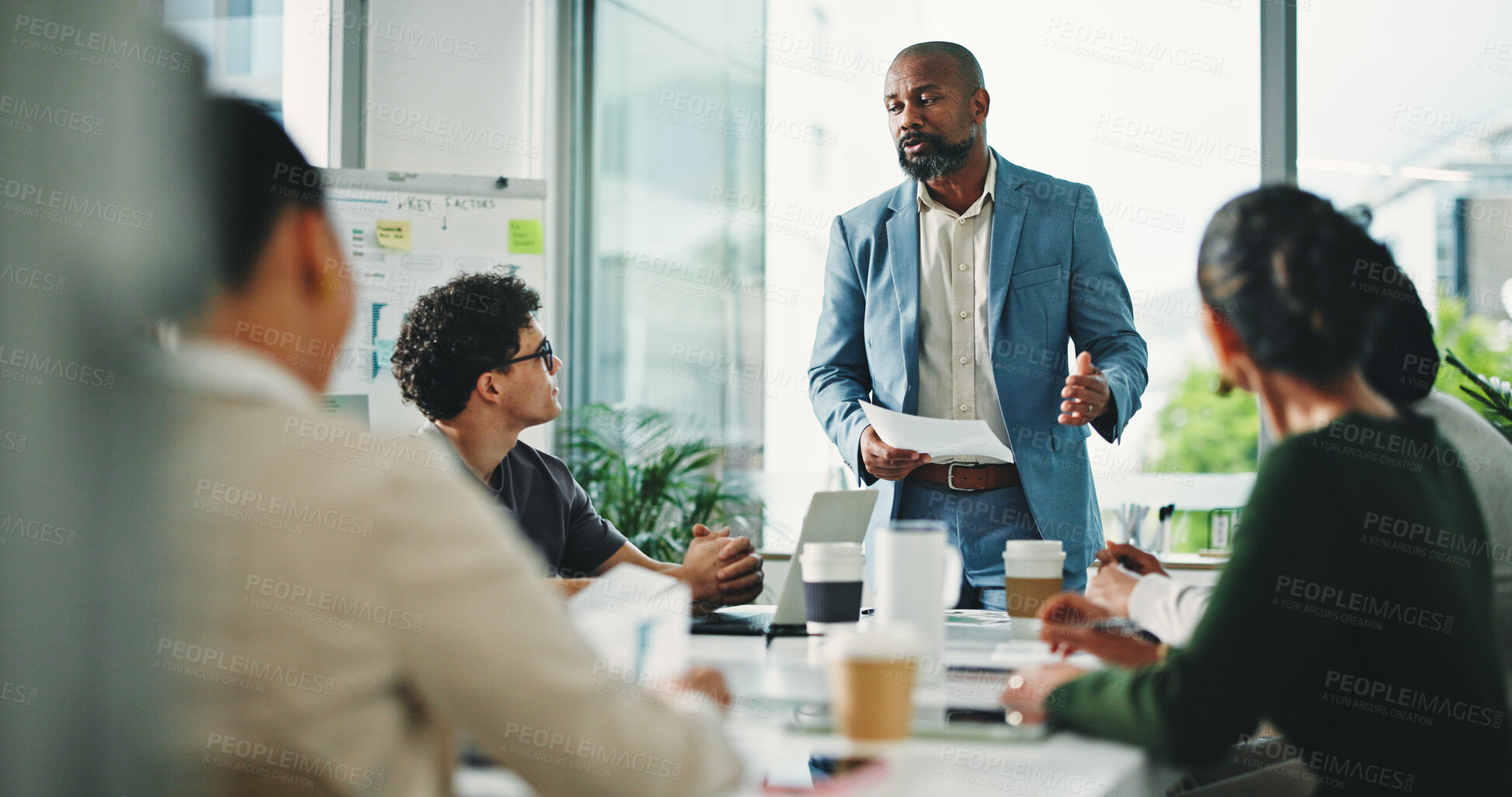 Buy stock photo Man, presentation and group at office meeting, talk and review with documents at finance company. Person, speaker and paperwork with team, feedback and planning for strategy at investment agency