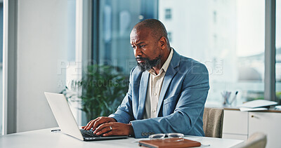 Buy stock photo Laptop, typing and black man in office with research for finance report with business budget. Computer, reading and African financial manager working on investment proposal with email in workplace.