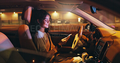 Buy stock photo Business, night and phone with happy woman in car on city street for commute to destination. App, ride and smile with professional employee in vehicle for directions of drive in dark urban location