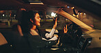Singing, driving or happy woman in car at night, listening to radio or dancing for travel entertainment. Transport, music playlist or driver with sound system for fun, dark road or trip in vehicle