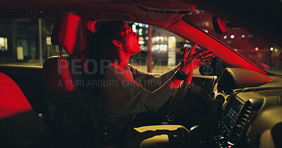Buy stock photo Angry, night and woman in car with shouting, road rage and stress management in traffic delay. Upset, red light and driver in vehicle with screaming, frustrated and mad in late evening commute.