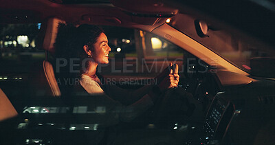 Buy stock photo Night, driving and woman in car, smile and transportation with urban town, relax and travel. Driver, happiness and person in city, vehicle and automobile with journey and adventure in New York