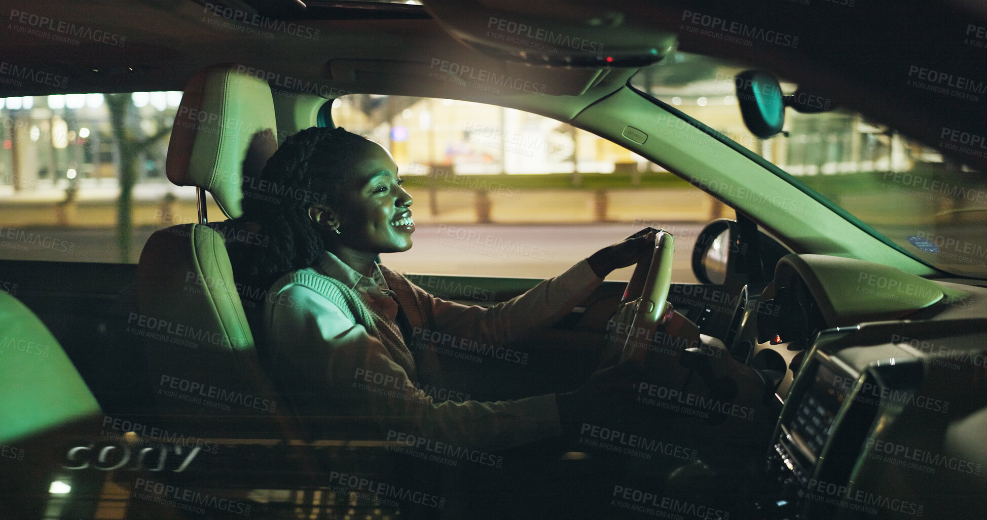 Buy stock photo Business, drive and night with black woman in car on city street for commute to destination. Journey, transportation and travel with happy African employee in vehicle for ride in dark urban location