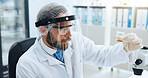 PPE, sample and science with man in laboratory for development, investigation or medical research. Analysis, container and visor with doctor at work on chemical reaction, clinical trial or experiment