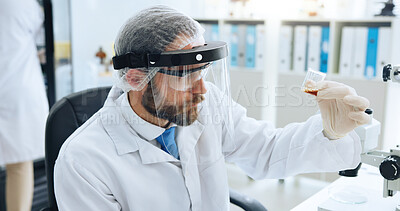 Buy stock photo Sample, science and visor with man in laboratory for development, investigation or medical research. Analysis, container and PPE with doctor at work on chemical reaction, clinical trial or experiment