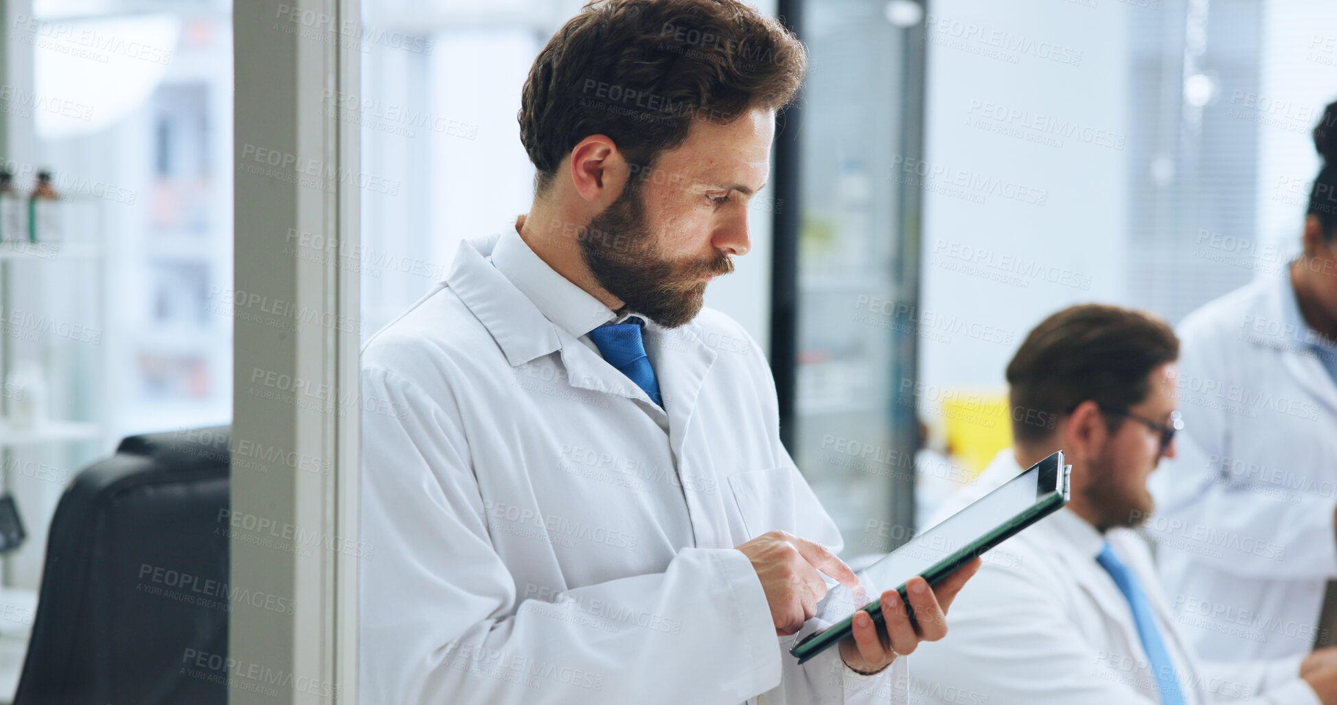 Buy stock photo Scientist, man and tablet in laboratory for development, medical research or innovation. Science, technology and person with experiment report, pharmaceutical review or study with test feedback