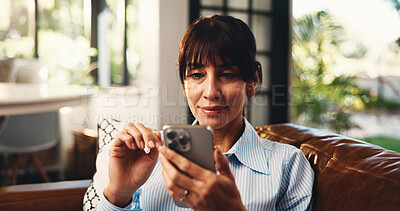 Buy stock photo Scroll, reading or woman on couch with phone, online streaming or message on social media. Smile, chat or mature person in house with tech, e book subscription or email update on digital app.