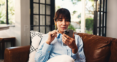 Buy stock photo Scroll, reading or mature woman on couch with phone, online streaming or message on social media. Smile, chat or female person in house with tech, e book subscription or email update on digital app.