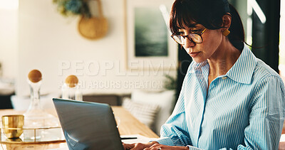 Buy stock photo Laptop, typing and woman in home office as freelancer, reading research or review ebook. Computer, remote work and mature author in house for planning story, editing manuscript and publication email