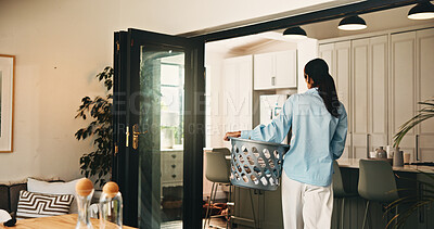 Buy stock photo Woman, laundry basket and cleaning in home, hygiene and routine for dirt, chores and back in morning. Person, container and domestic task for washing clothes, fabric and sanitation at apartment