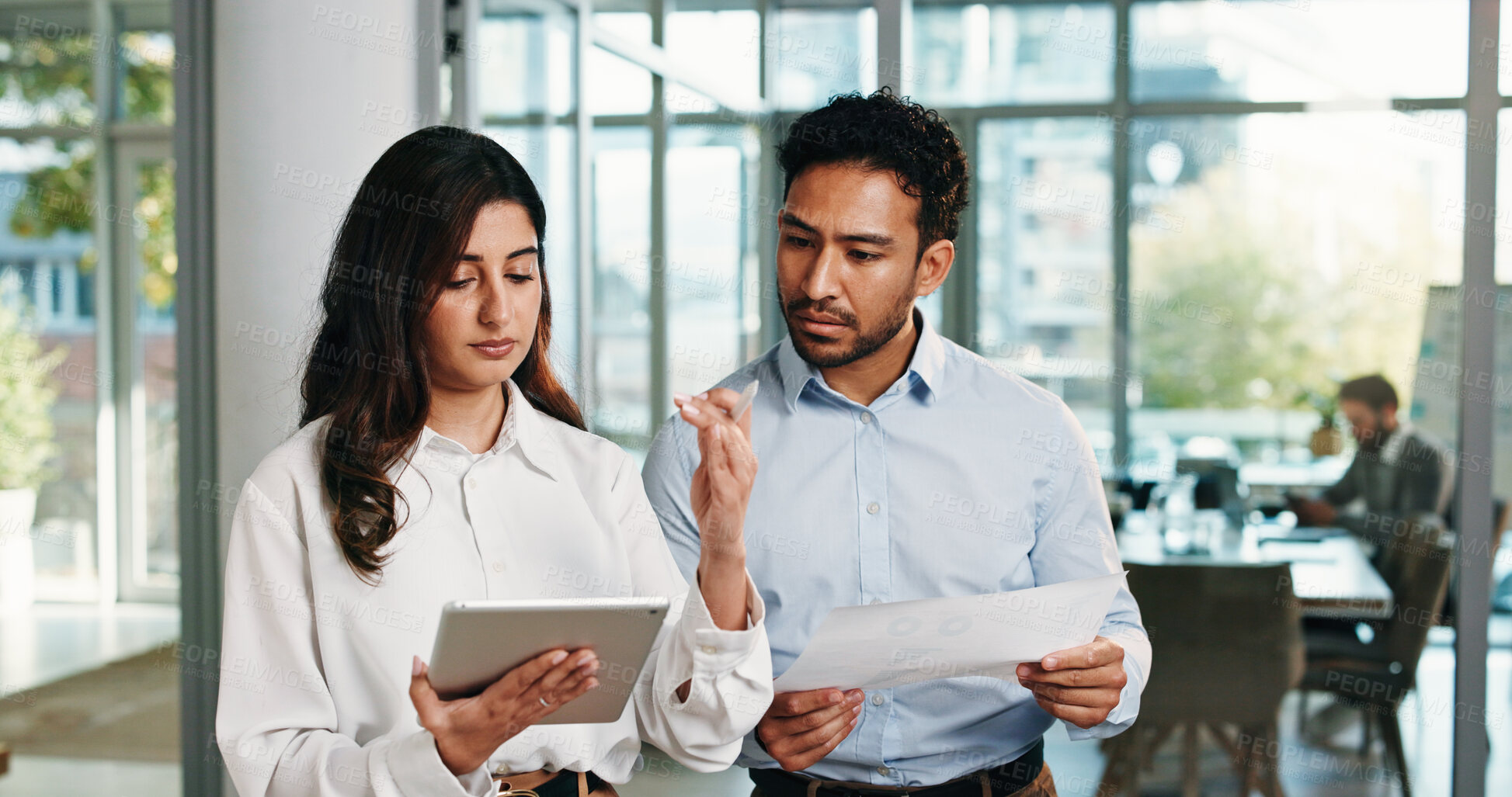 Buy stock photo Documents, tablet and business people in meeting for finance review, discussion and budget planning. Office, corporate team and woman with man on digital tech, paperwork and online financial report